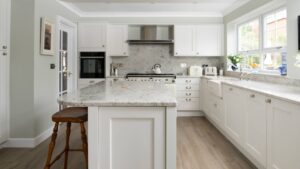 White shaker kitchen with cup handles